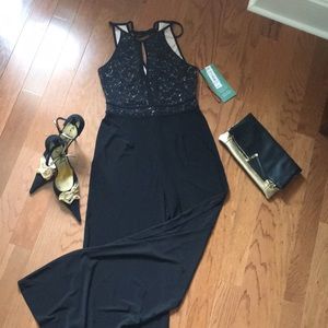 NWT jumpsuit. Size 6